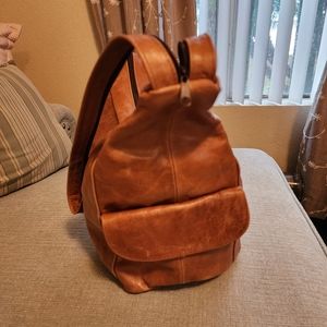 Brand new with tags genuine leather shoulder bag/ backpack! Excellent condition